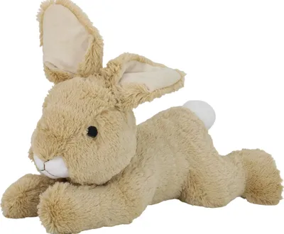 A plush toy rabbit lying down on a white background.