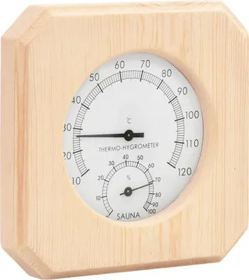 A close-up of a wooden-framed thermo-hygrometer for a sauna.