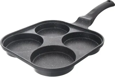 A black frying pan with four circular indentations for cooking, shown from a slightly elevated angle against a white background.