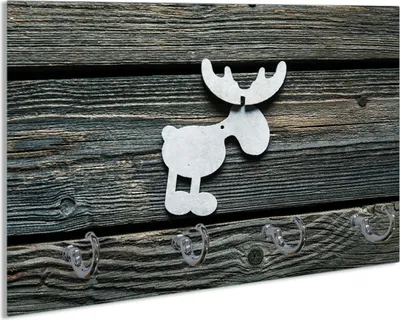 Produktbild von Wallario Schlüsselbrett aus Glas, Motiv: Elch Symbol in weiß, vor dunklem Holz, 30 x 20 cm mit 4 Haken