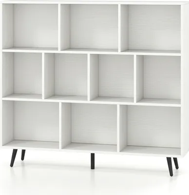 A white bookshelf with multiple compartments and black angled legs, shown against a white background.