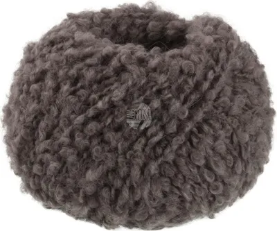 A ball of gray-brown yarn with a curly texture.