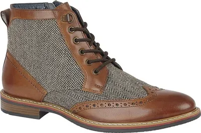 A single brown leather and tweed boot is shown against a white background.