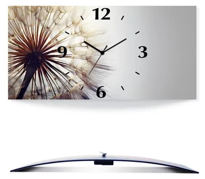 A wall clock with a dandelion image and a curved base.