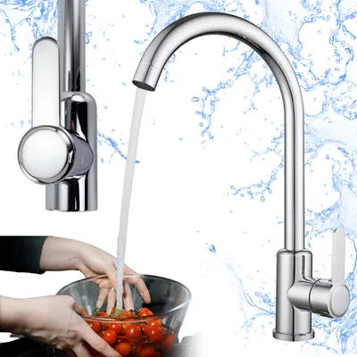 A kitchen faucet with water running into a bowl of tomatoes being washed by hands.
