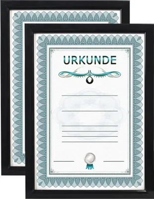 Two framed certificates are shown, one slightly behind the other.