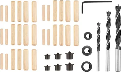 A collection of wooden dowels, drill bits, and other woodworking accessories laid out on a white background.