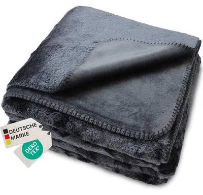 Produktbild von NYVI Kuscheldecke CozySherpa 150x200 cm Anthrazit - Wendedecke mit Wärmender Wollimitat Seite & Seidenweicher Flanellseite - Luxus Sofadecke Couchdecke - Fusselfrei, Pflegeleicht,