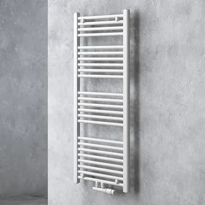 A white radiator is mounted on a textured gray wall.