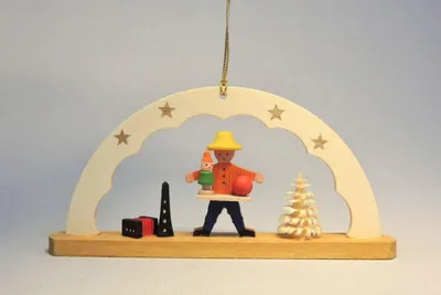 Produktbild von Christbaumschmuck Schwibbogen mit Spielzeughändler Höhe= 4,5cm NEU
