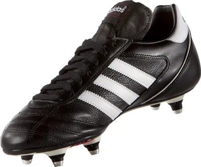 A black Adidas Kaiser 5 Cup soccer cleat with white stripes and red accents is shown against a white background.