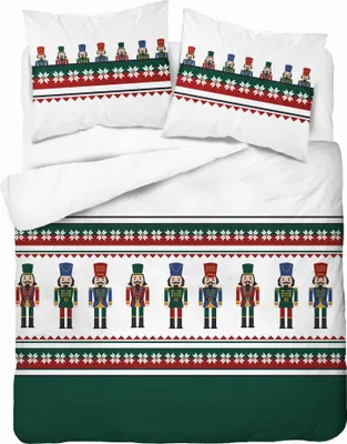 A Christmas-themed bedding set with nutcracker designs.