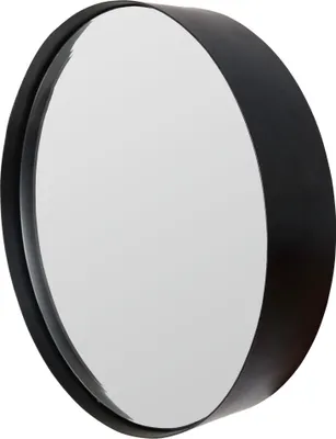 A close-up, angled view of a round black metal mirror.
