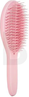 A pink hairbrush is shown against a white background.