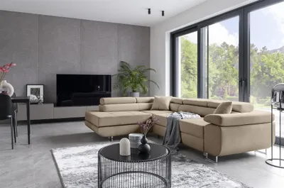 Productafbeelding van Eckbank met slaapfunctie, model SARRA, bekleed met beige stof, met een losse ottomaan aan de linkerkant