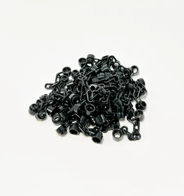 A pile of black LEGO chain links on a white background.