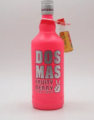 A bright pink bottle of Dos Mas Fruity Berry Pink Shot with a small yellow shot glass attached.