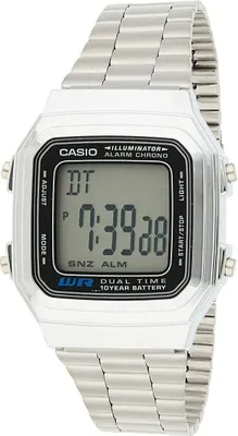 A close-up studio shot of a silver digital Casio watch.