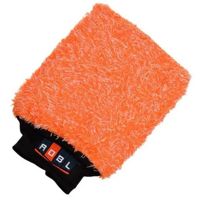 A fluffy orange car wash mitt with a black cuff and a label with the brand name.