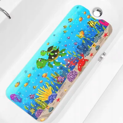 A colorful bath mat with an underwater theme, featuring cartoon sea creatures like turtles, fish, and jellyfish, placed inside a white bathtub.