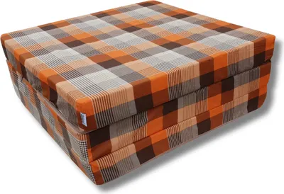 A folded mattress with a plaid pattern.