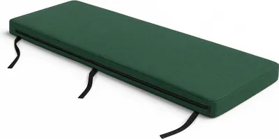 A green bench cushion with black ties is shown on a white background.