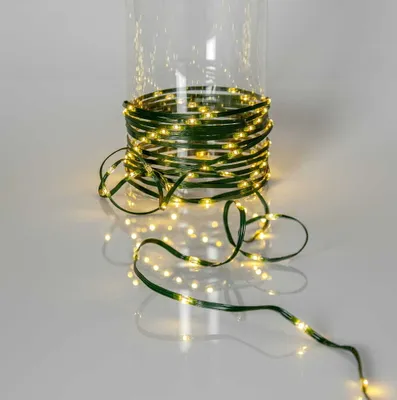 Imagen del producto de Guirnalda de luces LED, modelo "Dew Drop Micro", para uso en exteriores, luz blanca cálida, 15 metros, color verde