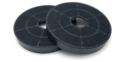 Two circular charcoal filters are placed on a white background.