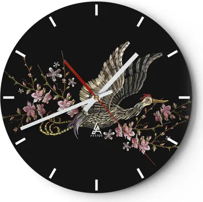 A round wall clock with a black background, featuring an embroidered design of a bird and flowers.