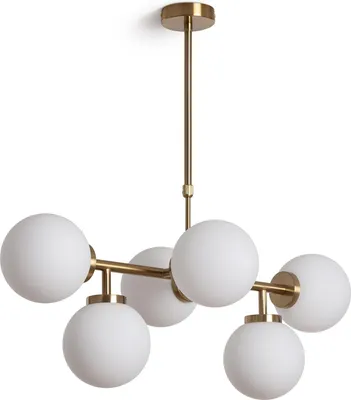 A modern pendant light with a gold metal frame and six white glass globes, suspended from a ceiling mount.
