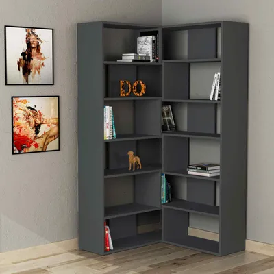 A modern anthracite corner bookshelf unit with various books and decorative items.