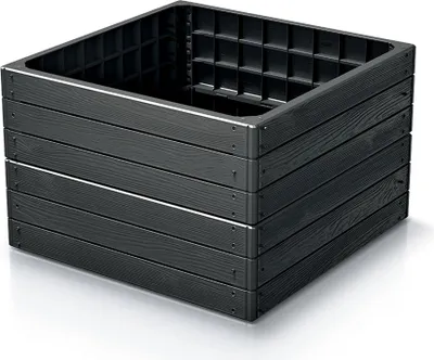 A black raised garden bed with a wood-like texture, shown from a slightly elevated angle.