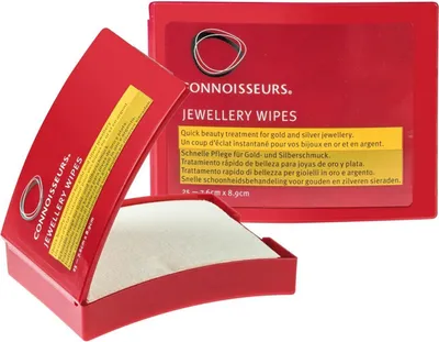 A red box of Connoisseurs Jewellery Wipes is shown open, revealing the wipes inside.