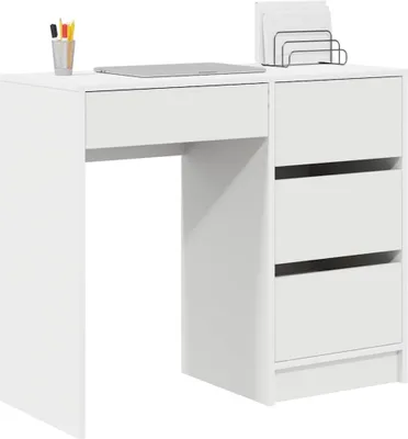 A white desk with drawers and a laptop on top.