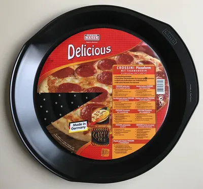 Produktbild von Kaiser Crossini Pizzaform, 37 x 35 x 2,5 cm, mit gewelltem Thermoboden und Ausformschräge