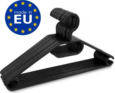 A stack of black plastic clothes hangers is shown diagonally against a white background.