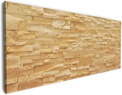 Produktbild von Wallario Premium Leinwandbild Steinwand gelb-orange in Größe 60 x 150 cm