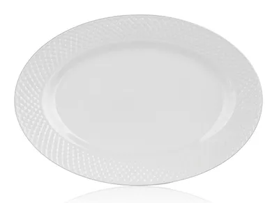 A white oval plate with a textured rim, isolated on a white background.