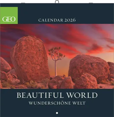 A calendar cover featuring a landscape photograph of large rocks and a tree against a dramatic sunset sky.
