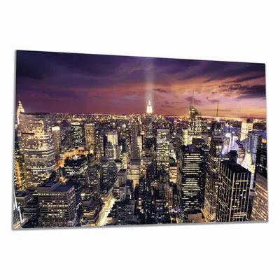 Produktbild von Wallario Herdabdeckplatte aus Glas, Größe 80 x 52 cm 1-teilig, Motiv New York bei Nacht - Panoramablick über die Stadt