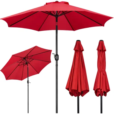 A collection of red patio umbrellas against a white background.