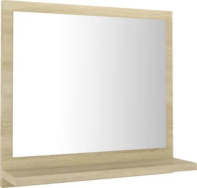 A mirror with a wooden frame and shelf, shown against a white background.