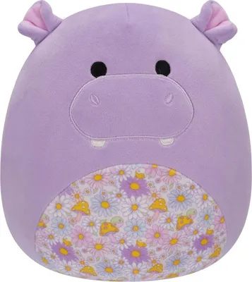 A plush toy hippo with a floral and mushroom pattern on its belly.