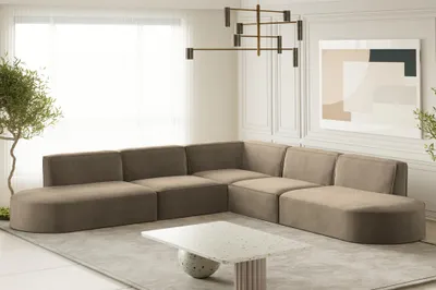 A modern living room with a large sectional sofa.