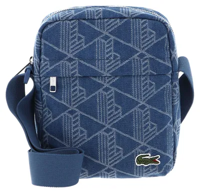 Zdjęcie produktu dla Torba na ramię LACOSTE Vertical Camera Bag Mono Jacquard Denim, niebieska