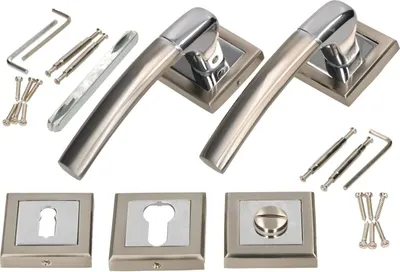 A set of door handles and related hardware, including screws and an Allen wrench, laid out on a white background.
