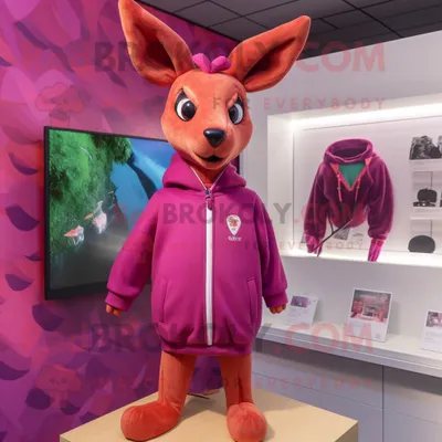 Produktbild von Magenta-Reh REDBROKOLY Maskottchen Kostüm figur bekleidet mit einer Windjacke und Ohrringen