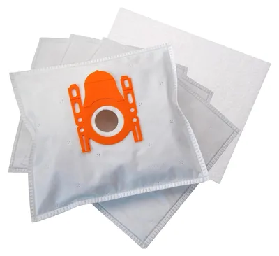 A stack of white vacuum cleaner bags with orange plastic connectors.