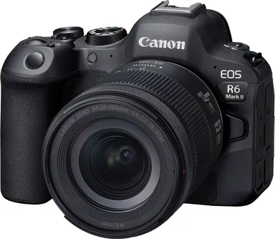 A black Canon EOS R6 Mark II camera with a lens attached, shown from a front-diagonal angle against a white background.