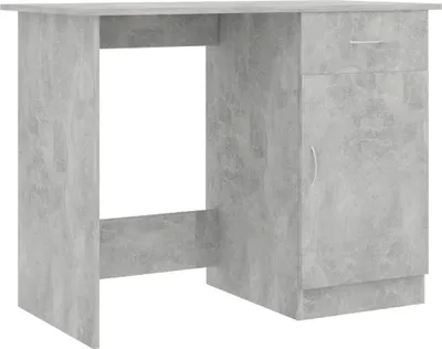 A concrete grey desk with a drawer and a cabinet.